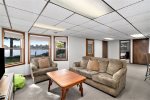 Lower level living area with views of Hutchins Lake
